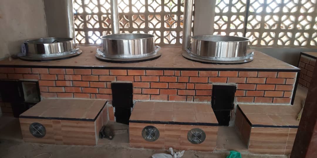 Solar aided cookstoves with reusable volcanic stones