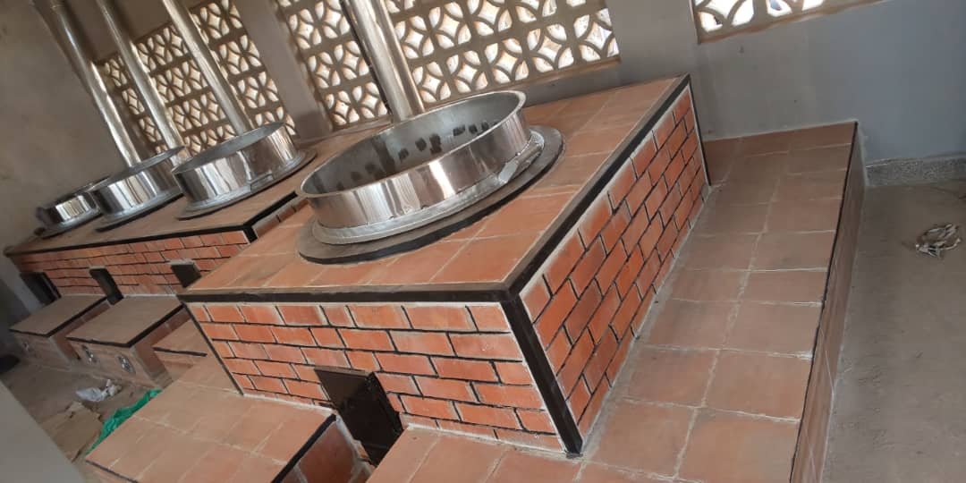 Solar aided cookstoves with reusable volcanic stones